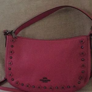 Pink studded Coach handbag